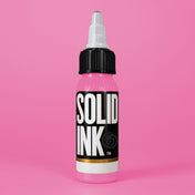 Solid Ink Bubblegum tattoo ink 2 oz bottle on coloured background