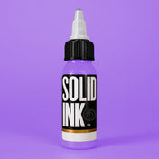 Solid Ink Lavender tattoo ink 2 oz bottle on coloured background