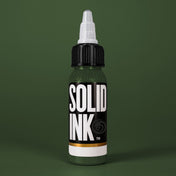 Solid Ink Olive tattoo ink 2 oz bottle on coloured background