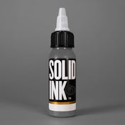Solid Ink Smoke tattoo ink 2 oz bottle on coloured background