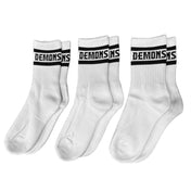 Three pairs of Demons white crew socks, DEMONS wordmark knit across the ribbed cuff